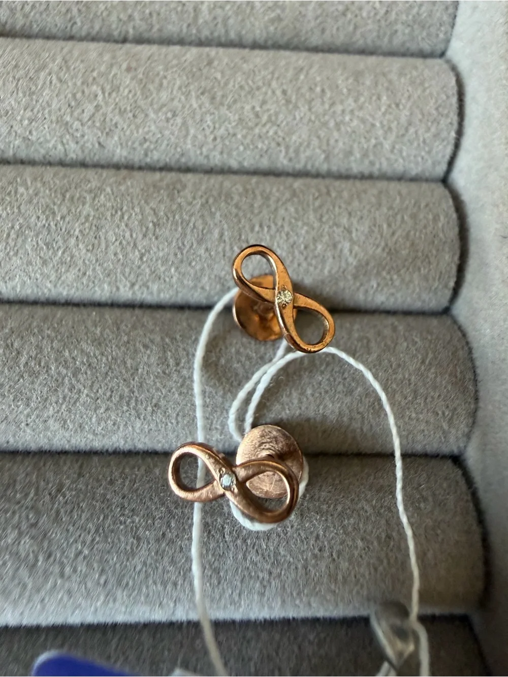 Gold plated sterling silver Infinity Stud Earrings with Sparkling Accent